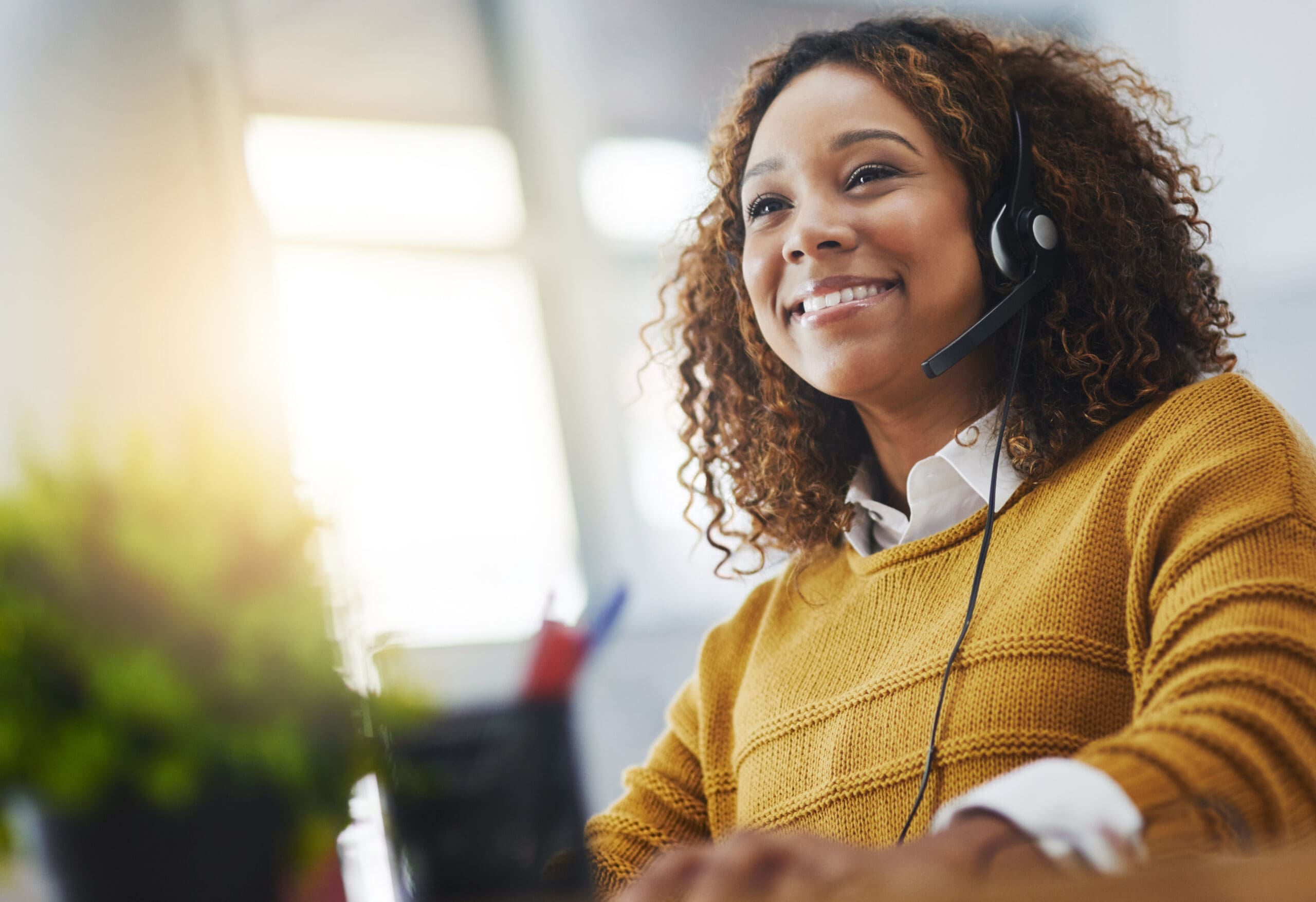Shot of a female agent working in a call center