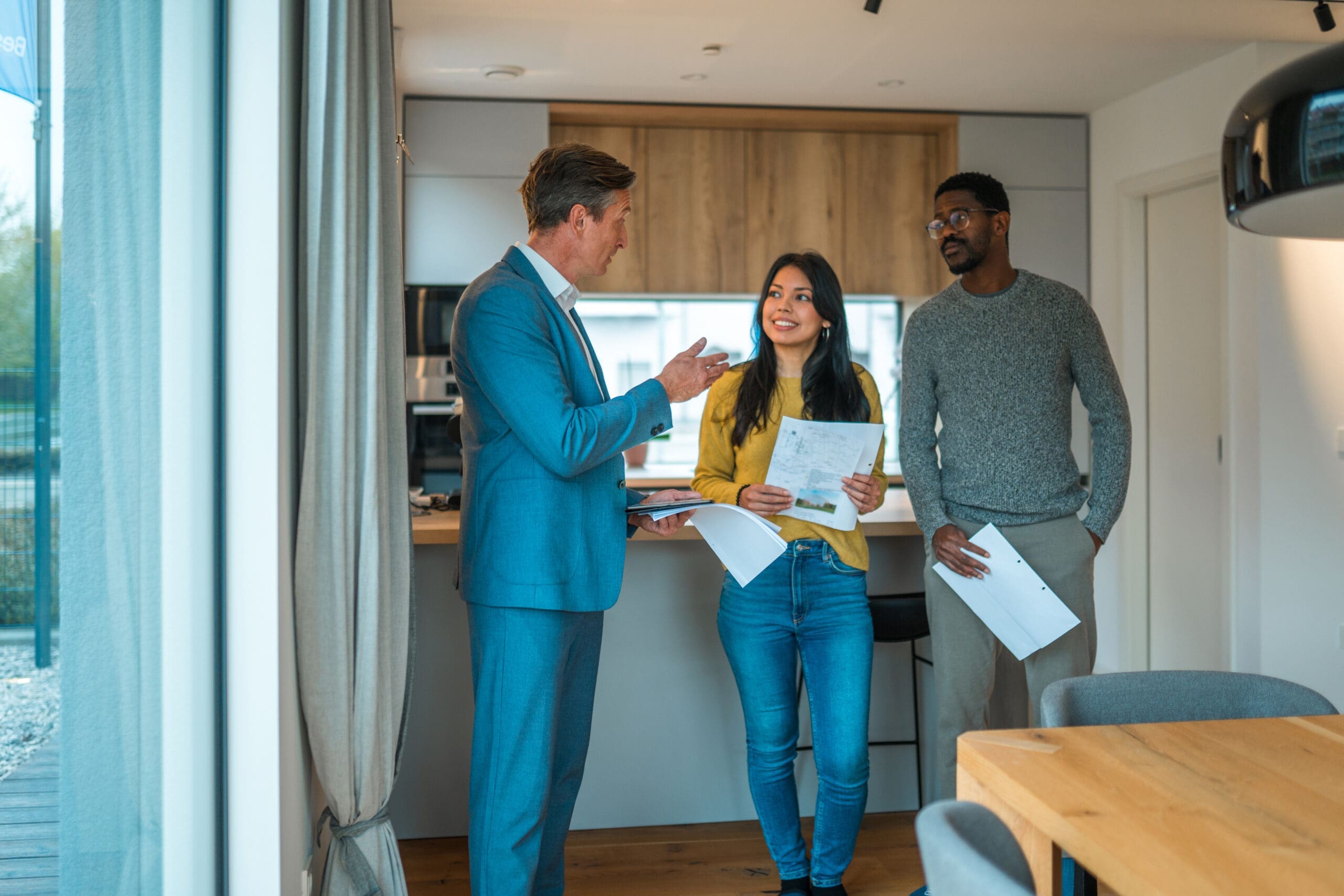 Real Estate Agent Showing a home to a couple